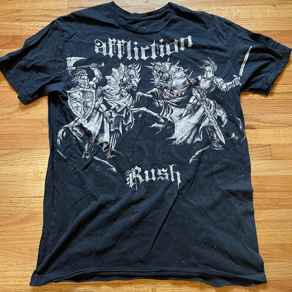 Georges “Rush” St-Pierre

UFC
Signature series
Affliction grunge alt distressed